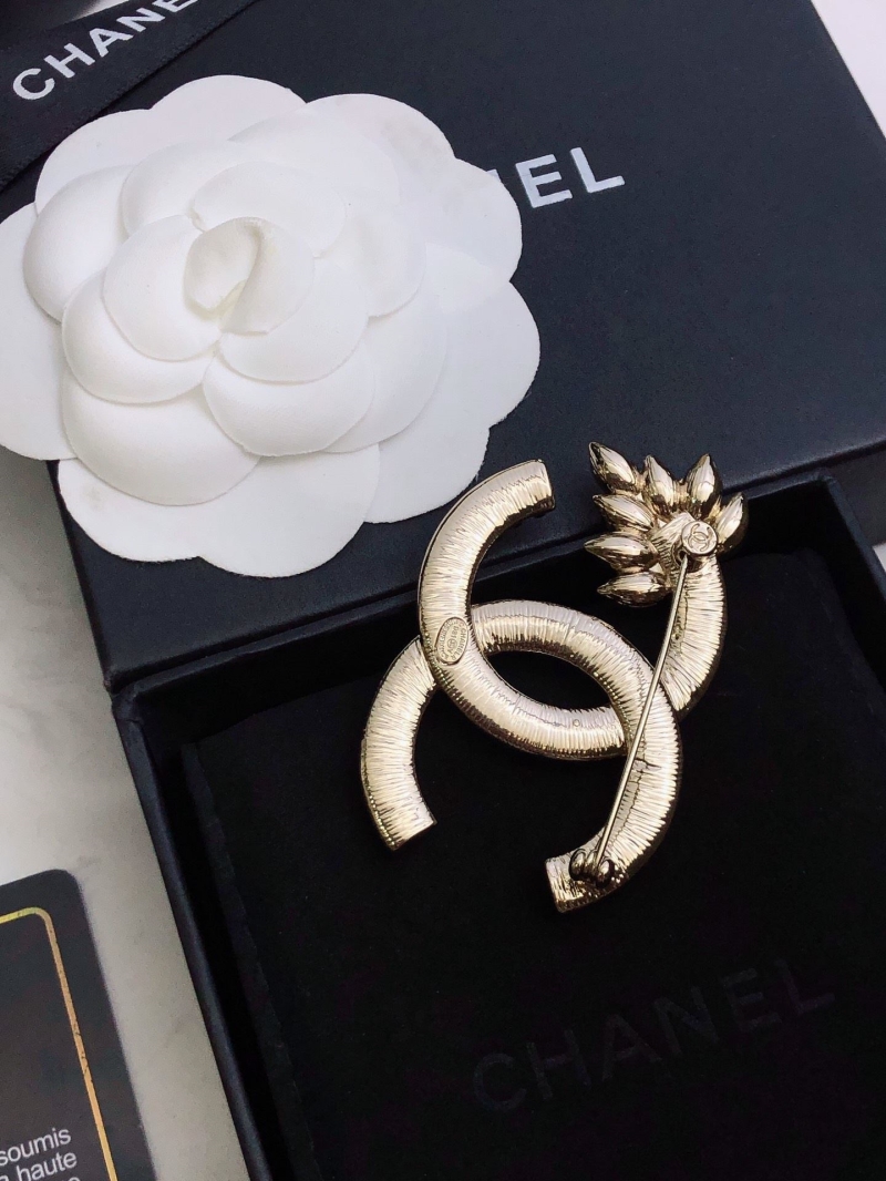 Ch**el brooches
